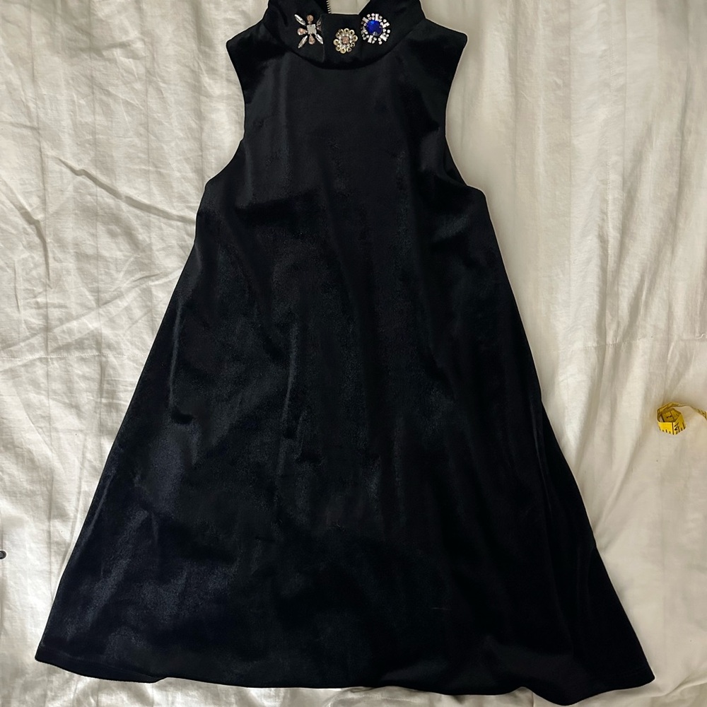 Elegant Black Sleeveless Dress with Embellishments